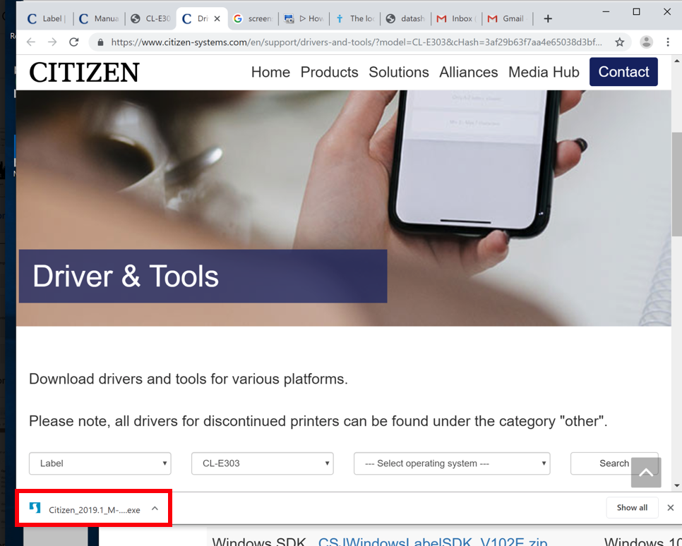 Le site web Citizen s'ouvre dans le navigateur Google Chrome et le pilote E303Z pour Windows se télécharge.